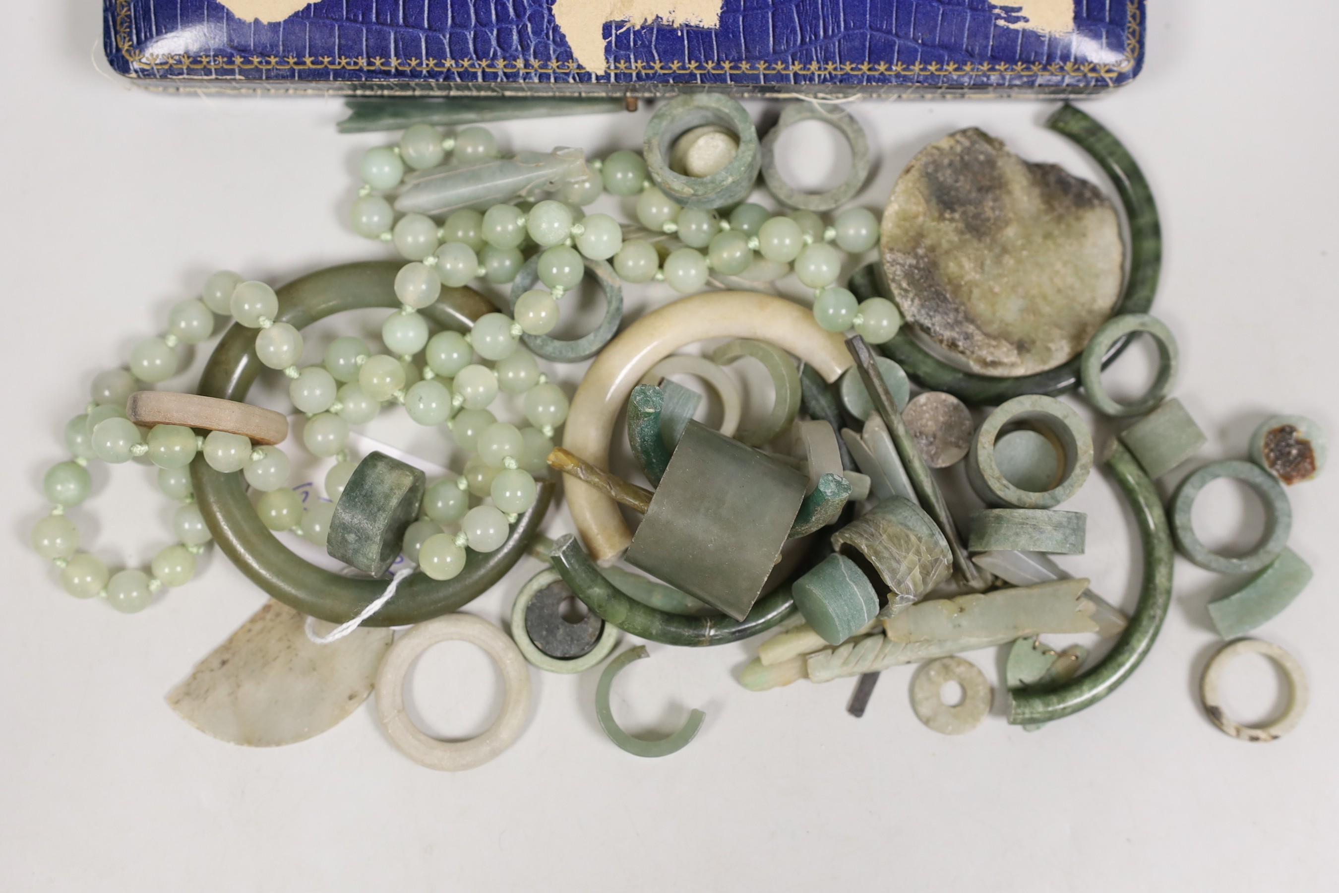 A Chinese hardstone bead necklace and related jade, jadeite etc. jewellery parts